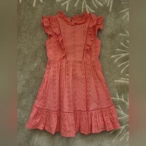 Janie and Jack. Size 10 eyelet Ruffles. Color is Coral